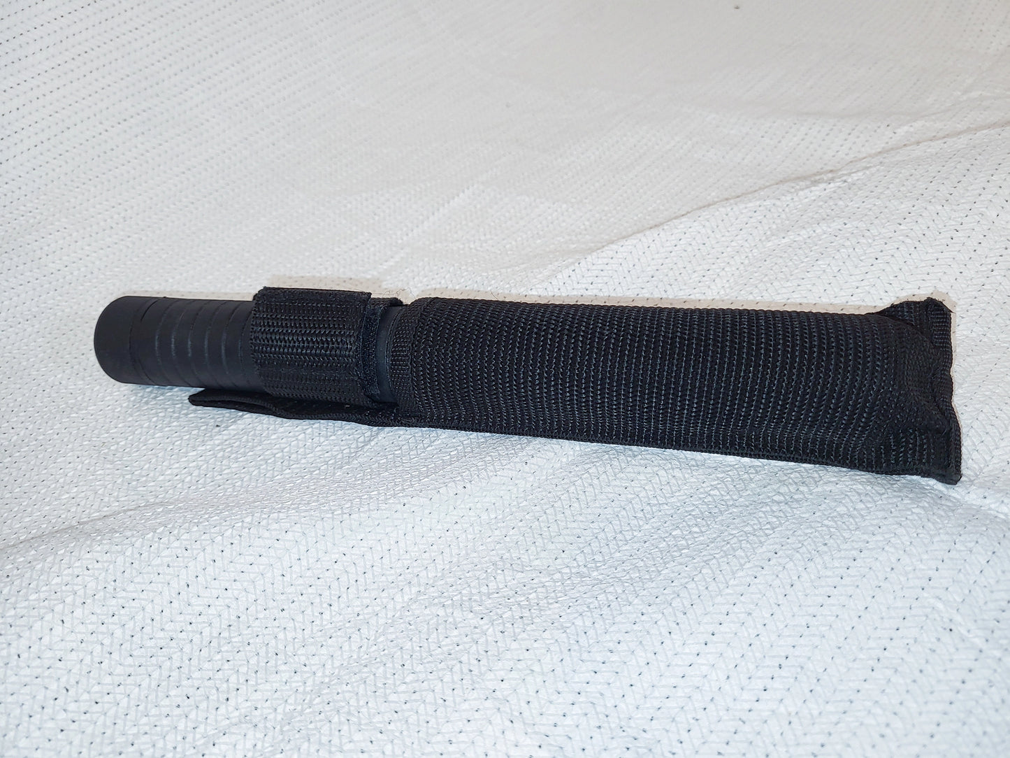 Extendable baton, black, polymer with sheath